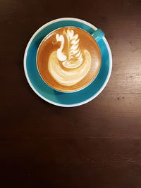 Directly above shot of cappuccino on table