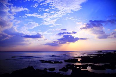 Scenic view of sea against sky during sunset