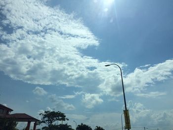 Low angle view of street light against sky