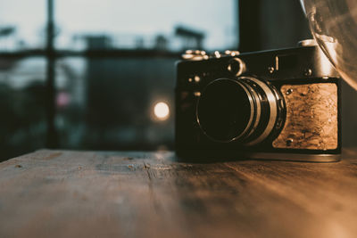 Close-up of camera on table