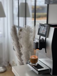 Close-up of coffee cup on table