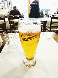 Close-up of beer in glass on table
