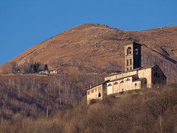 View of old building against blue sky