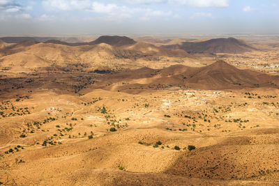 Aerial view of desert against sky