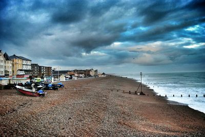 Scenic view of sea against cloudy sky