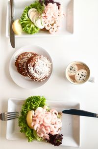 High angle view of food served on table