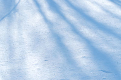 High angle view of shadow on snow