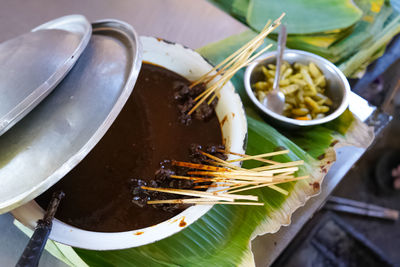 Buffalo satay is a traditional food from kudus, central java, indonesia that uses peanut sauce.