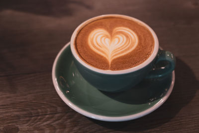 High angle view of cappuccino on table