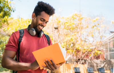 Young man using mobile phone