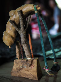 Close-up of rusty metal on table