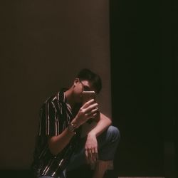 Young man looking at camera