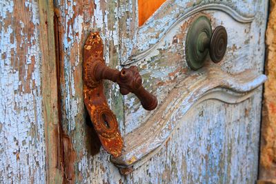 Close-up of old rusty metal door