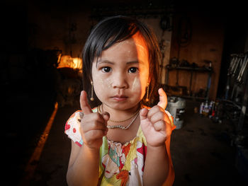 Portrait of cute girl at home