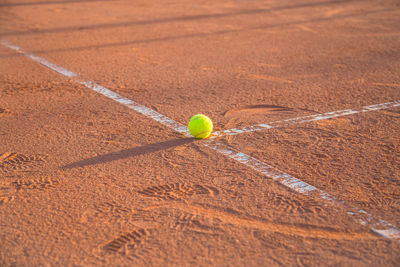 High angle view of tennis ball on field