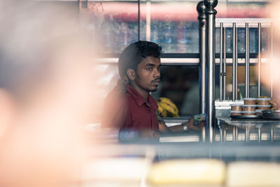 Portrait of a serious young man working