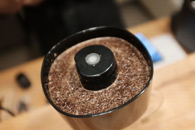 High angle view of coffee cup on table