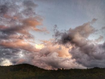 Scenic view of field against sky during sunset