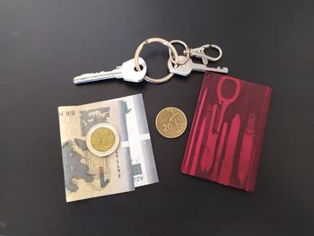 High angle view of coins on table