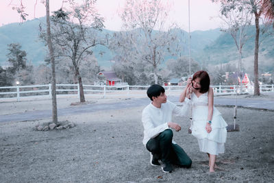 Couple enjoying at park