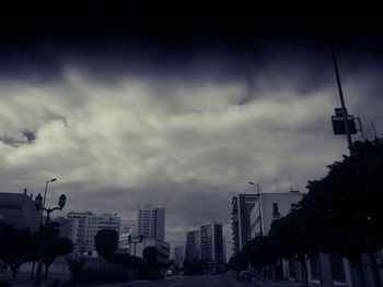 Low angle view of building against cloudy sky