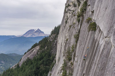 Two men hanging on portaledge on the squamish chief with garibaldi