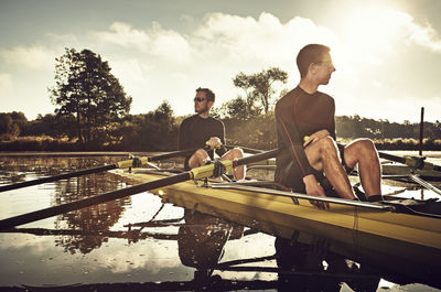 Young men canoeing