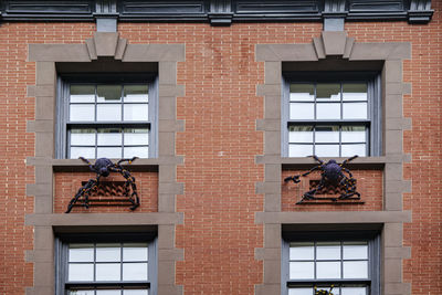 Front of apartment building decorated with spider web for halloween holiday in manhattan new york