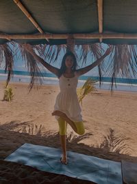 Full length of woman on beach