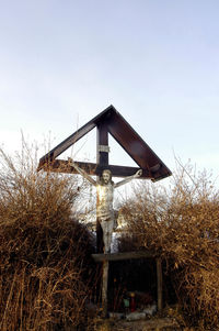 Built structure on field against clear sky