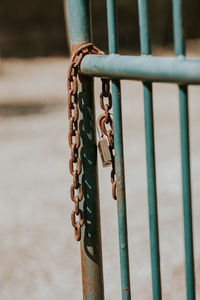 Close-up of chain and railing