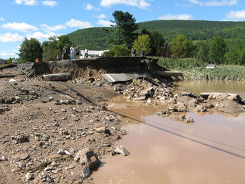 Scenic view of mountain against cloudy sky