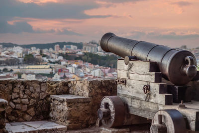 Close-up of fort against sky during sunset