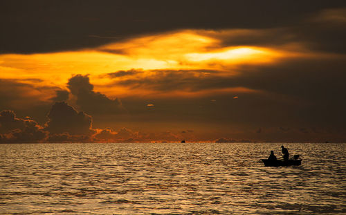 Scenic view of sea at sunset