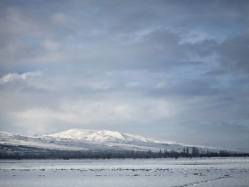 Scenic view of snow covered mountains