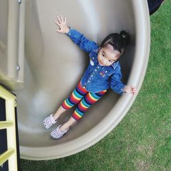 Cute girl playing in playground