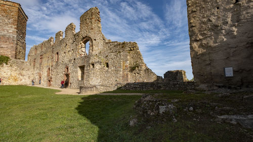 Old ruin building against cloudy sky