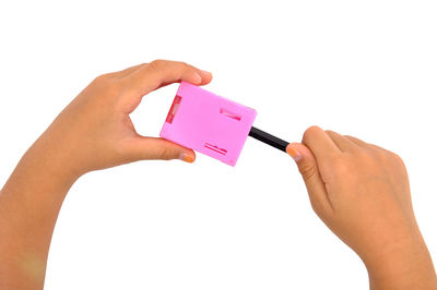 Woman holding hands over white background