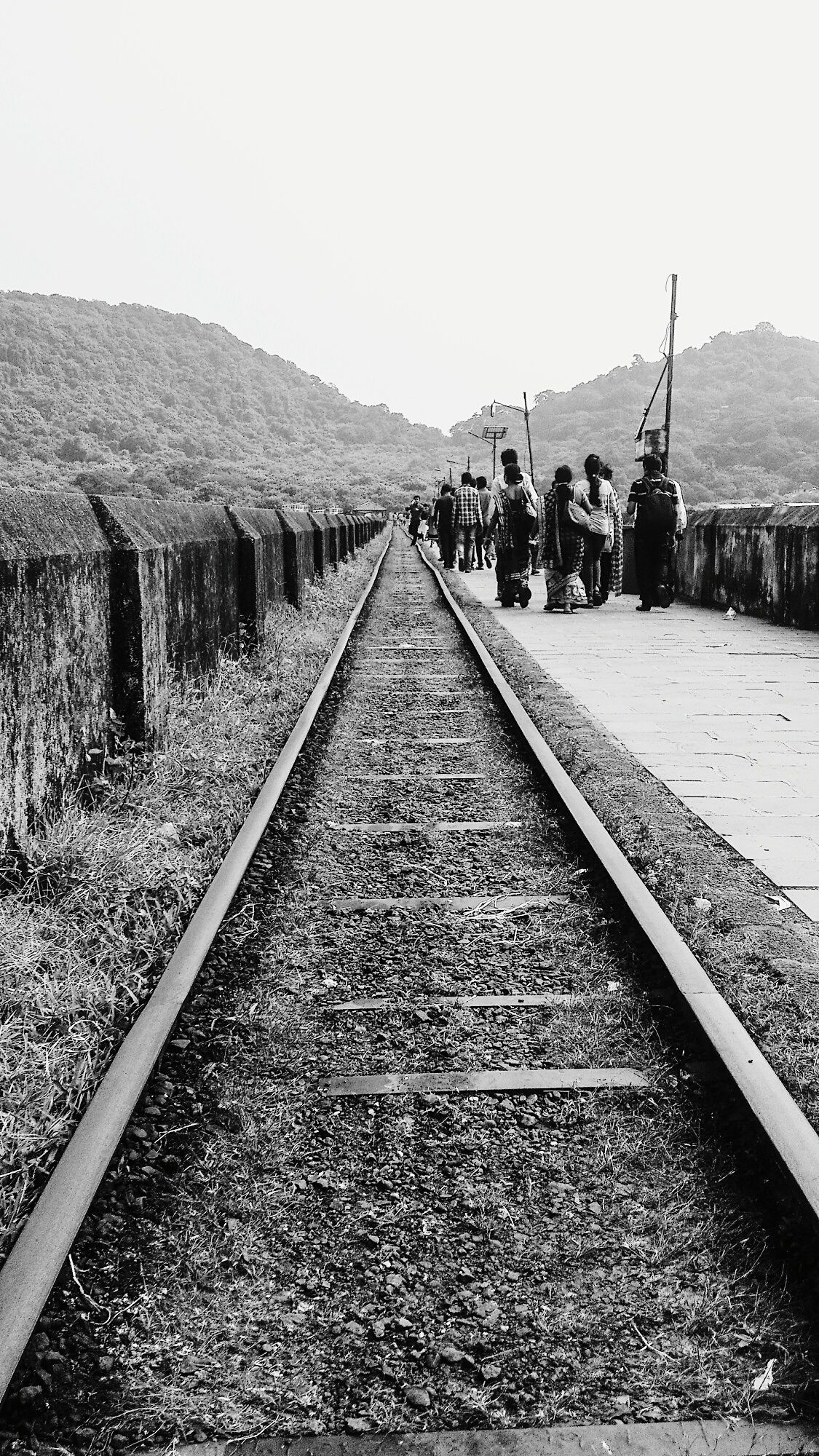 Miles Away railroad track outdoors