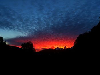 Scenic view of dramatic sky during sunset