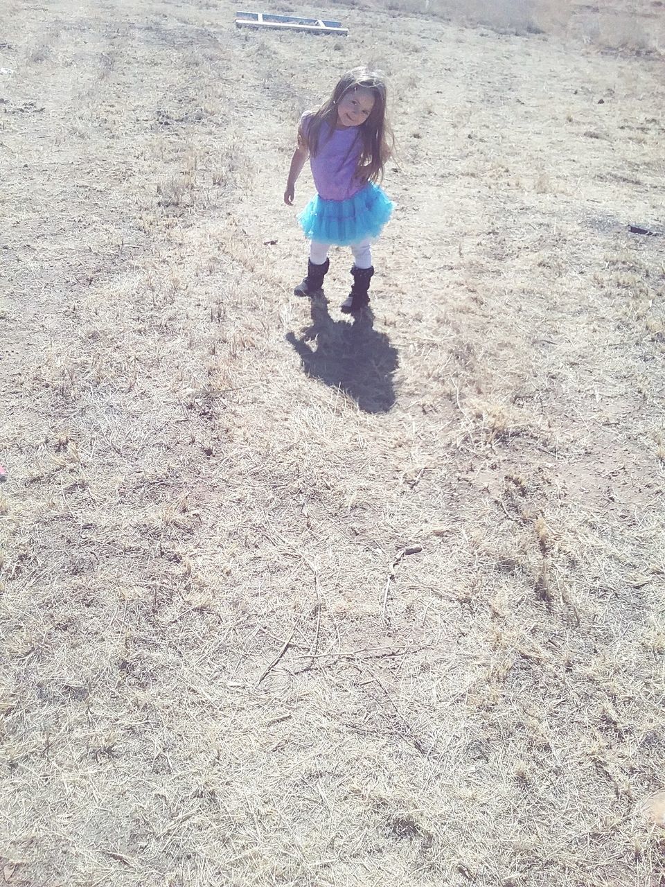 FULL LENGTH OF GIRL PLAYING WITH TOY