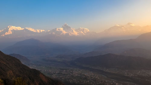 Scenic view of mountains against sky during sunset