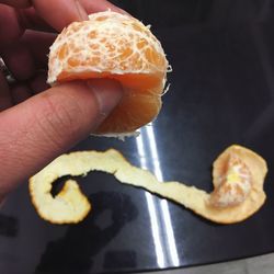 Close-up of hand holding ice cream