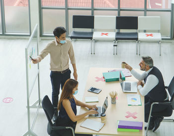 Group of people working on table