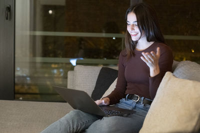 Portrait of woman using mobile phone