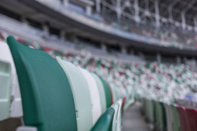 Close-up of empty seats in building