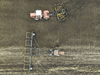 High angle view of cars on field