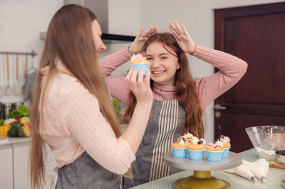 Portrait of woman with chocolate cake