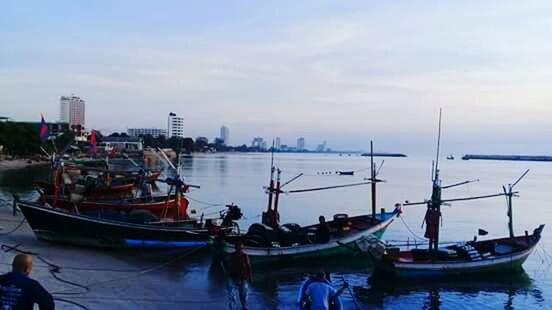 nautical vessel, mode of transportation, transportation, water, sky, moored, sea, nature, harbor, architecture, city, travel, cloud - sky, no people, waterfront, building exterior, ship, travel destinations, built structure, outdoors, sailboat, yacht, fishing industry, fishing boat