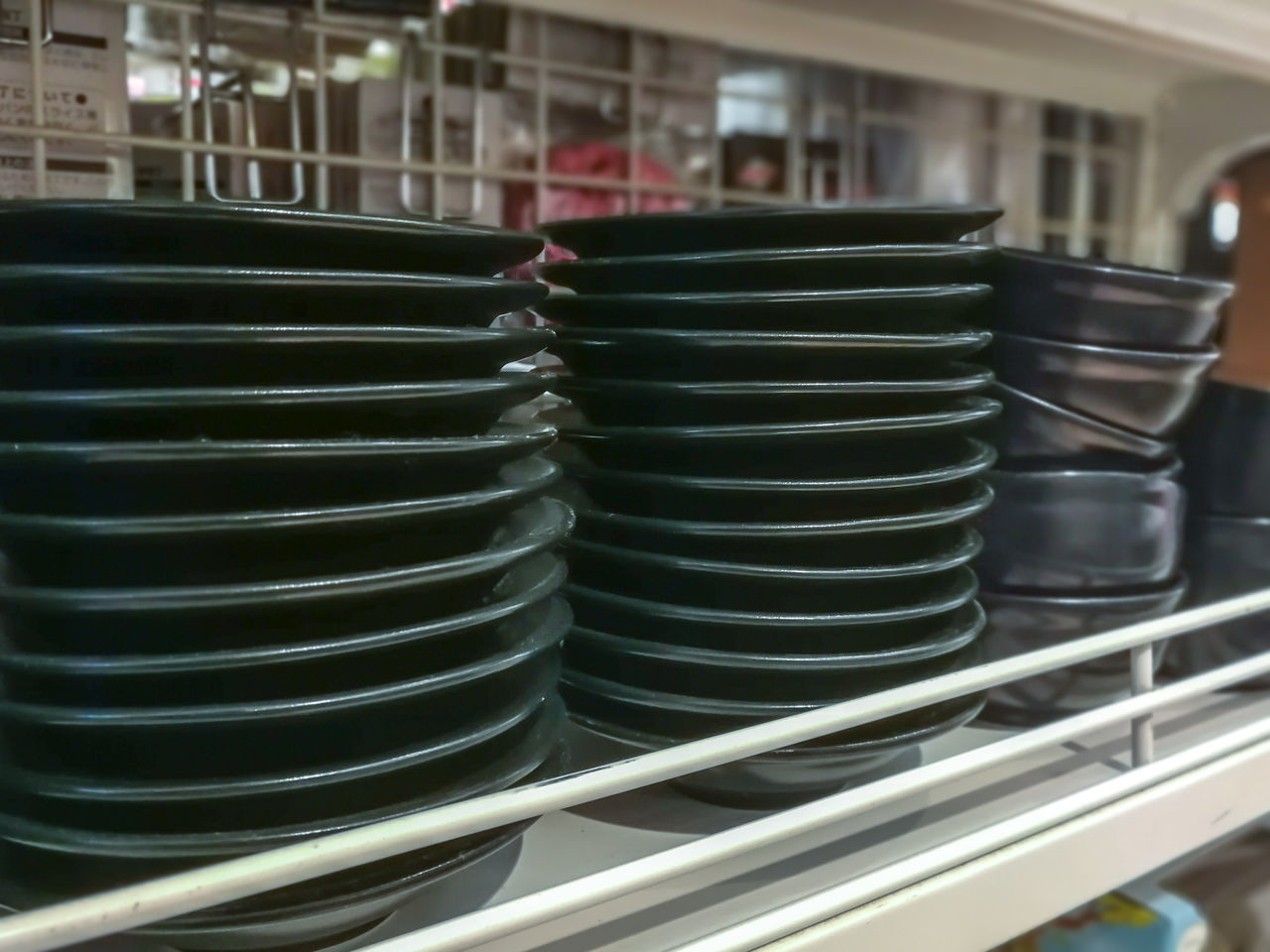 CLOSE-UP OF STACK OF PIPES IN KITCHEN